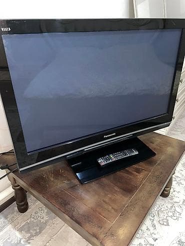 oled tv: Телевизор Panasonic Viera с плоским экраном и черной рамкой — 1