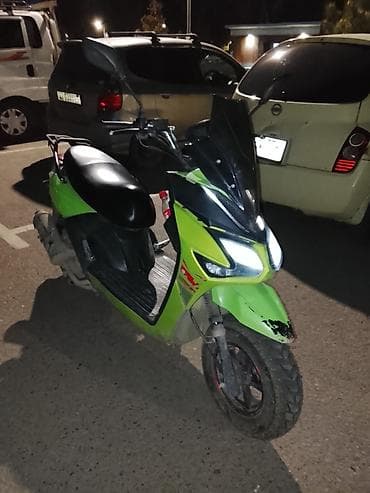 bmb 39: Скутер/мопед городского типа, ярко‑зелёный с чёрными элементами — 2