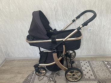 Игрушки: Детская коляска AmiGo (логотип AmiGo на раме), универсальная — 1