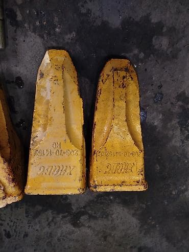 Насадки и держатели зубьев на ковш экскаватора Состав: - 5 желтых — 2