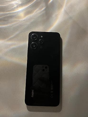 tecno telefon: Redmi 12 черный 
есть маленькая трещина в верхнем углу телефона — 1