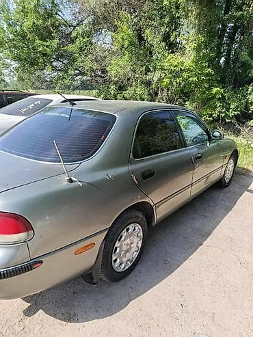 2 4 д: Mazda 626: 1996 г., 2 л, Механика, Бензин, Седан — 4