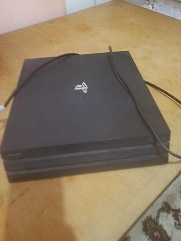 Игровая консоль Sony PlayStation 4 Pro (серия CUH-7xx, чёрный цвет)
