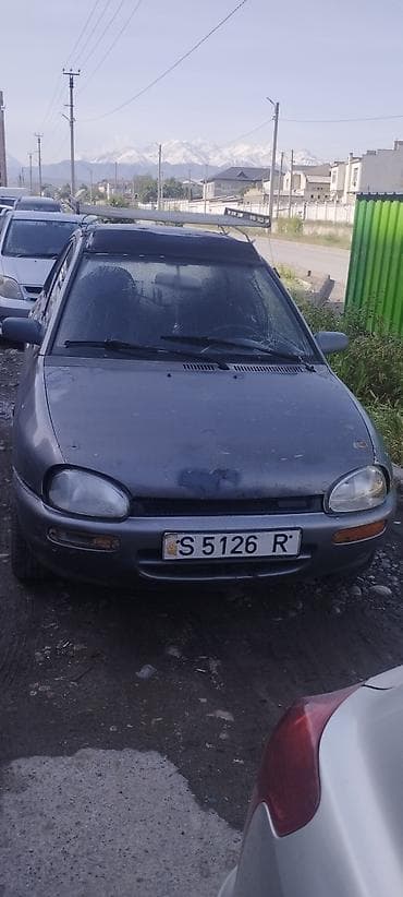 Mazda 121: 1991 г., 1.3 л, Механика, Бензин