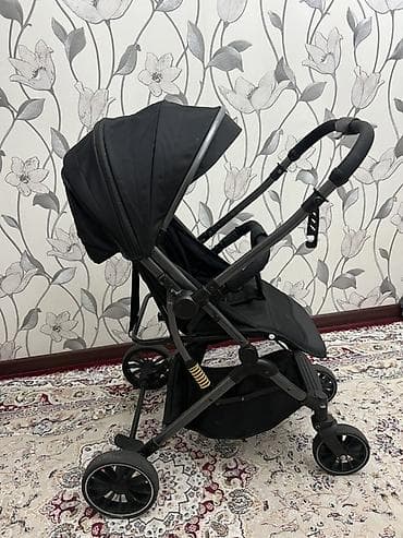 муфта в коляску: Прогулочная коляска, цвет черный. Особенности: - Легкая складная рама — 2