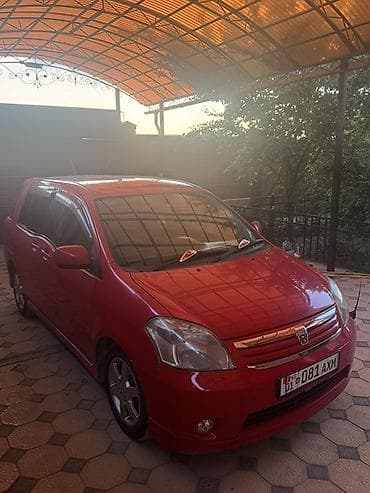 сут машине: Toyota Raum: 2004 г., 1.5 л, Автомат, Бензин, Хетчбек — 3