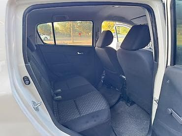 byd e1: Daihatsu Cuore: 2009 г., 1 л, Автомат, Бензин, Хэтчбэк — 7