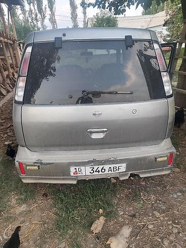 Nissan Cube: 2002 г., 1.3 л, Кол менен иштөөчү, Бензин, Хетчбек — 6