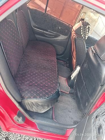 cl 63: Mazda 323: 1999 г., 1.8 л, Ручные, Бензин, Хэтчбэк — 5