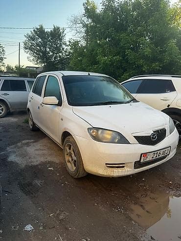 mini v: Mazda Demio: 2004 г., 1.3 л, Автомат, Бензин, Седан — 4