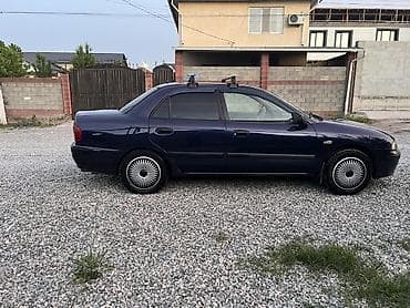 муссо автомобиль: Mitsubishi Carisma: 2000 г., Газ, Седан — 2