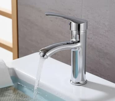 Однорычажный смеситель для раковины, выполненный в современном стиле