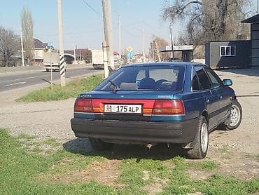 launch 431: Mazda 626: 1991 г., Седан — 1