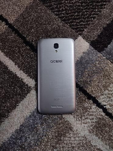 p 10: Alcatel Pop 4 (Серый) Телефон компактный, удобно лежит в руке — 5