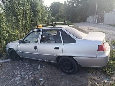 devo matiz: Daewoo Nexia: 2010 г., Механика, Седан — 1