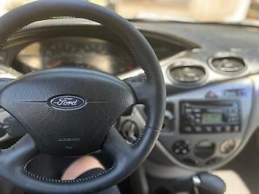 диски рамашки: Ford Focus: 2003 г., 2 л, Автомат, Бензин, Хэтчбэк — 5