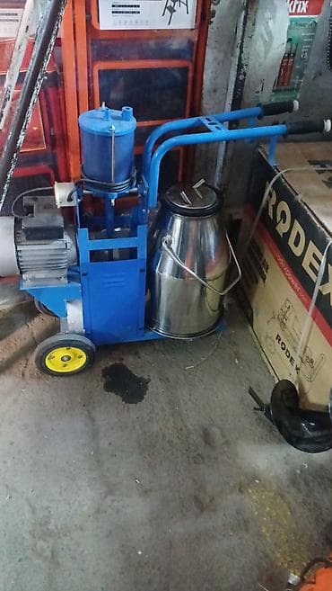 молочный машинка: Переносной доильный аппарат для коров - Электрический вакуумный — 1