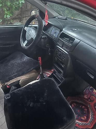 дайхатсу куоре 2005: Daihatsu Cuore: 2004 г., 1 л, Механика, Бензин, Хэтчбэк — 4