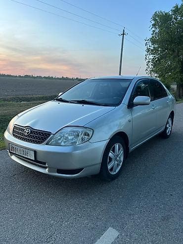 е 318: Toyota Corolla: 2004 г., Автомат, Бензин, Седан — 1
