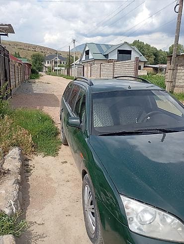 8: Ford Mondeo: 2003 г., 1.8 л, Механика, Газ, Универсал — 4