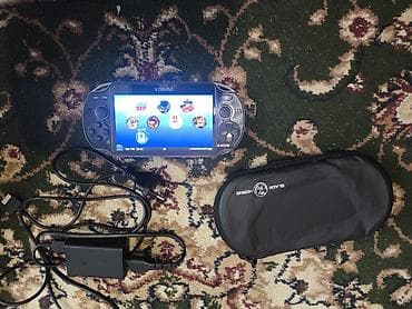 psp 3003: PS Vita (Sony) — портативная игровая консоль с 5" дисплеем и двумя — 1