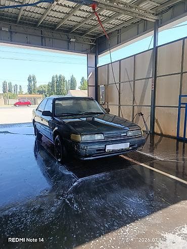 Транспорт: Mazda 626: 1990 г., 2 л, Механика, Бензин, Седан — 5