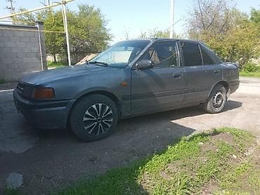 ремонт чемодана: Mazda 323: 1989 г., Механика, Бензин, Седан — 2