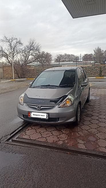 Honda Fit: 2006 г., 1.3 л, Автомат, Бензин, Хэтчбэк