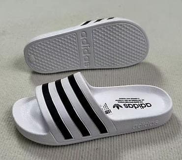 шлепа: Adidas Adilette — классические шлёпанцы с тремя полосками. Размеры — 6