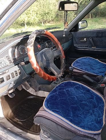 fort focus: Mazda 626: 1990 г., 2.2 л, Механика, Седан — 3
