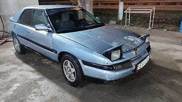 сг 9: Mazda 323: 1994 г., 1.6 л, Механика, Бензин, Лифтбек — 1