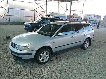210 e55: Volkswagen Passat Variant: 1999 г., 1.8 л, Механика, Бензин, Универсал — 3