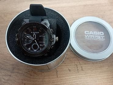 Часы Casio G‑Shock (аналогово‑цифровые) в фирменной круглой