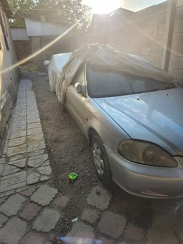 210: Honda Civic: 1999 г., 1.3 л, Вариатор, Бензин, Седан — 6