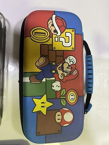 samsung 02: Nintendo Switch (OLED), неоново‑красно/синие Joy‑Con. Комплектация: - — 2