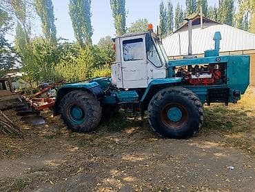 e 302: Трактор колесный 4х4 с шарнирно-сочлененной рамой + прицепной плуг — 3