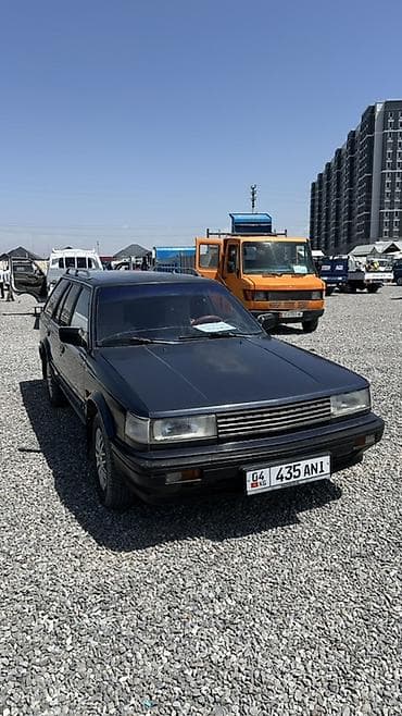 w211 e500: Nissan Bluebird: 1987 г. — 2