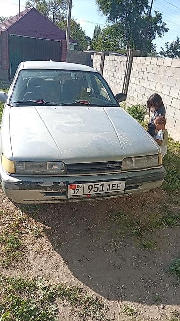 Mazda 626: 1999 г., Седан — 5