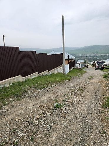 Продаётся жилой дом с участком в живописной холмистой местности