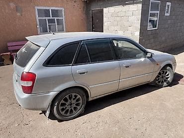 rx 7: Mazda Familia: 2001 г., 1.6 л, Механика, Газ, Универсал — 2
