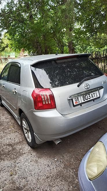 e 303: Toyota Allex: 2003 г. — 1