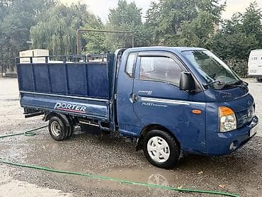 byd e2 2022: Hyundai Porter II, бортовой грузовик с открытой металлической — 2