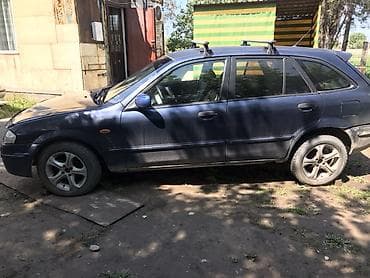 rx 7: Mazda 323: 2003 г., Ручные, Универсал — 1