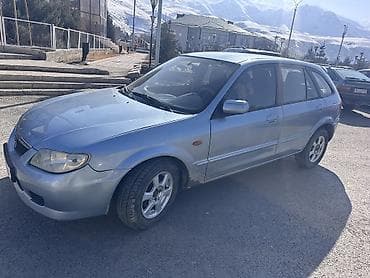 фары kia k5: Mazda 323: 2001 г., 1.6 л, Механика, Бензин, Хэтчбэк — 9
