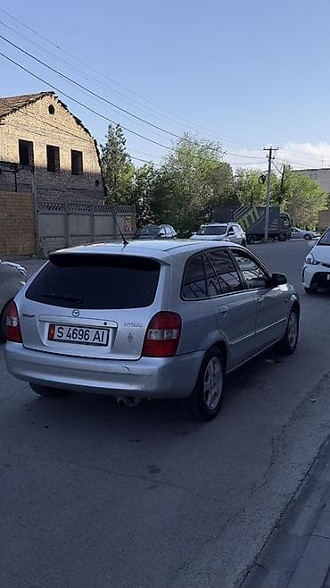 mini kooper: Mazda 323: 2001 г., 1.6 л, Ручные, Бензин, Хэтчбэк — 4