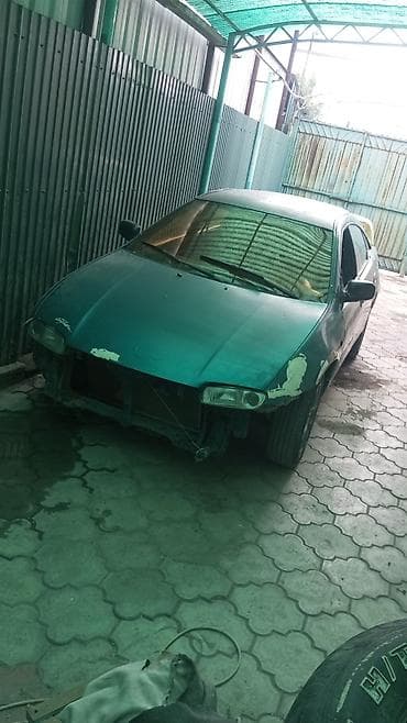 титан мазда демио: Mazda 323: 1994 г., 1.5 л, Механика, Бензин, Лифтбек — 2