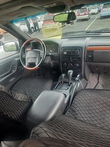 golf 7: Jeep Grand Cherokee: 1999 г., Внедорожник — 5