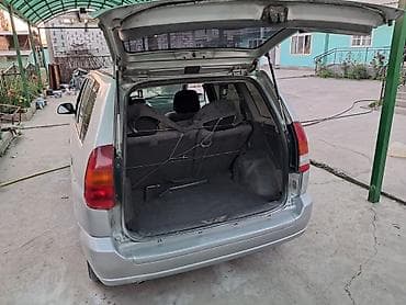 Mitsubishi Space Star: 1999 г., 1.3 л, Механика, Бензин, Универсал — 7