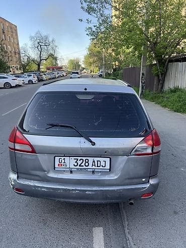 bid e2: Nissan Wingroad: 2001 г., 1.5 л, Автомат, Бензин — 2