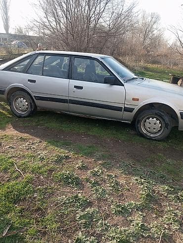 диски на авто 17: Mazda 626: 1989 г., Седан — 2